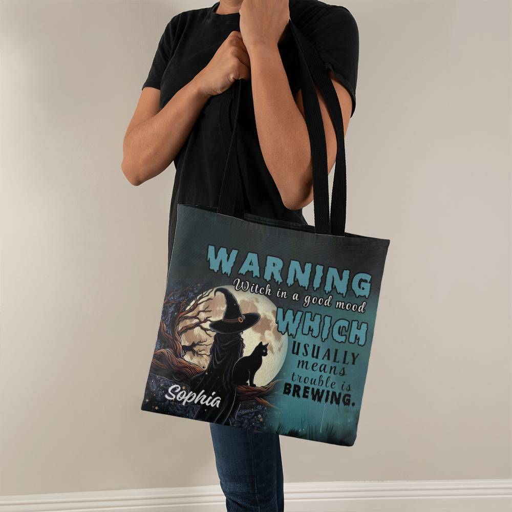 Witch and black cat tote bag