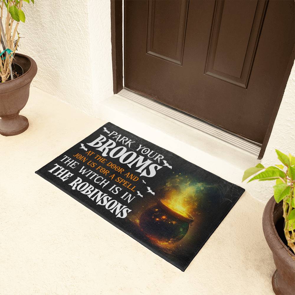 custom witch doormat with glowing cauldron and family name
